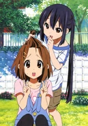 Azusa playing with Yui's hair.