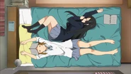 Mio and Ritsu in bed together.