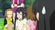 Azusa enjoys the food.