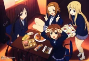 Mugi and her friends in their new clubroom.