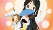 Ritsu reminding Mio of the first scratch on her bass.