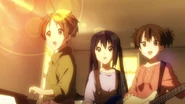 Ui, Azusa and Jun watch the sun come out.