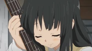 Mio is relieved that her bass is okay.
