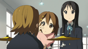 Ritsu absorbed in thoughts