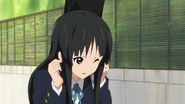 Mio is scared by Ritsu's lie about what she was watching last night.