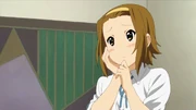 Ritsu, pretending to be Mio, does a flawless impression of Juliet.