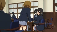 Kyōko and Kimiko Makigami talking with Ritsu during lunch.