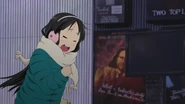 Mio is scared by a costumed man in London.