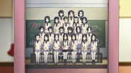 Yōko is standing in the second row, second from the right during the "Mio Fan Club Tea Party Pictorial".