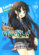 Mio on the cover of Volume 2