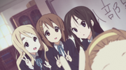 Mio, Tsumugi and Ritsu celebrating Yui joining the club.