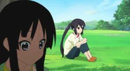 Azusa wonders why Mio is in the Light Music Club.