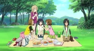 The club has a picnic to celebrate their new member.