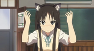 Mio secretly trying on cat ears