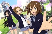 Ritsu, Mio and Yui passing out flyers.