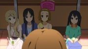 The others react to Yui's statement that they can go anywhere.