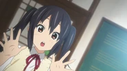 Azusa at the beginning of "Cagayake! GIRLS".