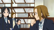 Ritsu demands a real cake in order for Yui to wake up.