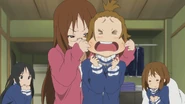Sawako punishes Ritsu.png (1.91 MB) Sawako pulls Ritsu's cheeks.