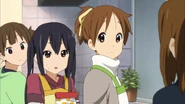 Ui, Azusa and Jun making chocolate.
