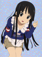 Mio wearing a flouncy pullover