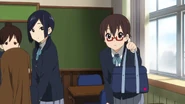 Akane watching Nodoka Manabe who has spare tights for Yui.