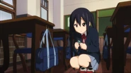 Azusa finds the sticker on her keychain.