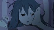 Azusa wakes up to Jun's foot in her face.