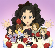 Azusa carrying a strawberry.