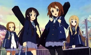 Mugi carrying her keyboard.