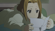 Ritsu reading her supposed love letter.