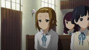 Ritsu and Yoshimi.png (1.79 MB) Yoshimi standing next to a sleepy Ritsu.