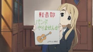Mugi with poster.jpg (267 KB) Tsumugi's leaflet for the club's recruitment poster.
