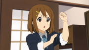 Yui prepares to handle the cooking.