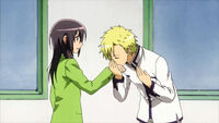 Igarashi kisses Misaki's hand