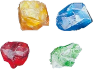 The red, blue, green and yellow Stone that would become the Flame, Water, Hurricane and Land Wizard Ring in the possession of Shigeru.