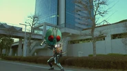 1 Arms is seen open its "mouth", biting Kamen Rider Fifteen.