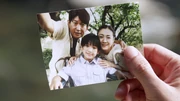 Takahito Taira with his wife and son.