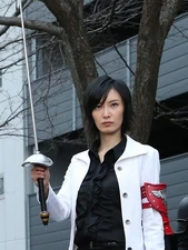 Igura holding the unnamed rapier
