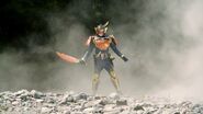 Gaim arrives in the World within the Magic Stone.