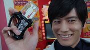 Dan holding Origin Gashat