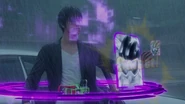Kuroto Dan selects Zombie Action's Gamer Level X-0, by touching the profile image with his left palm.