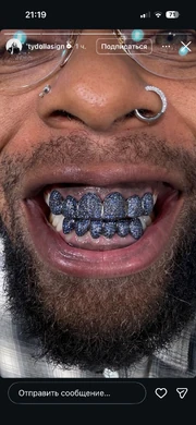 Photo of the featured artist, Ty Dolla $ign, recreating the  album cover.