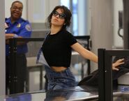 Camila passing through security at LAX March 14 2018 (19)