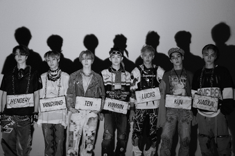 KUN, TEN, WINWIN, LUCAS, XIAOJUN, HENDERY, and YANGYANG promoting Awaken The World