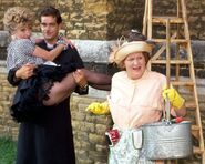 Rose fell from a ladder and landed in Vicar's arms, which led to a misunderstanding.