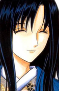 A smiling Megumi in a color page of the manga