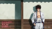 Sanosuke leaning on a wall