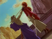 Shishio grabbing Kenshin by the neck