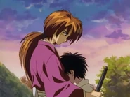 Yahiko apologizes to Kenshin for stealing his Sakabatō